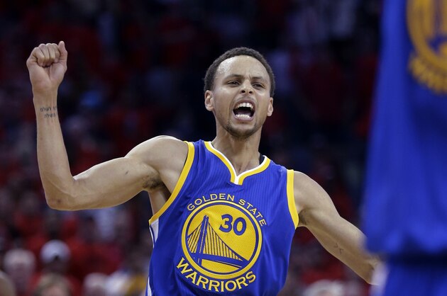 Golden State Warriors guard Stephen Curry celebrates the Warriors' 123-119 overtime victory over the New Orleans Pelicans in Game 3 of a first-round NBA basketball playoff series in New Orleans, Thursday, April 23, 2015. The Warriors took a 3-0 lead in the best-of-seven series. (AP Photo/Gerald Herbert)