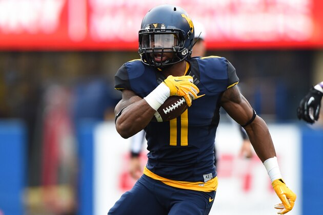 Nov 1, 2014; Morgantown, WV, USA; West Virginia Mountaineers wide receiver Kevin White (11) runs with ball after a catch during the first quarter against the TCU Horned Frogs at Milan Puskar Stadium. TCU Horned Frogs defeated West Virginia Mountaineers 31-30. Mandatory Credit: Tommy Gilligan-USA TODAY Sports Nov 1, 2014; Morgantown, WV, USA; West Virginia Mountaineers wide receiver Kevin White (11) runs with ball after a catch during the first quarter against the TCU Horned Frogs at Milan Puskar Stadium. TCU Horned Frogs defeated West Virginia Mountaineers 31-30. Mandatory Credit: Tommy Gilligan-USA TODAY Sports