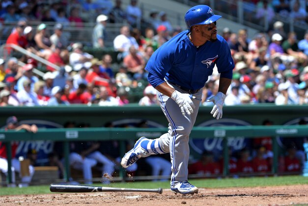 Apr 1, 2015; Fort Myers, FL, USA; Toronto Blue Jays second baseman Devon Travis (77) connects for an RBI single during the fourth inning against the Boston Red Sox at JetBlue Park. Mandatory Credit: Steve Mitchell-USA TODAY Sports