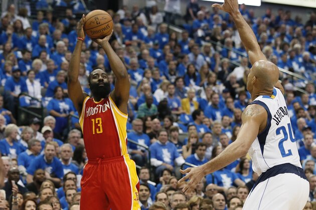 Houston Rockets' James Harden (13) shoots over Dallas Mavericks' Richard Jefferson (24) during the first half of Game 3 in an NBA basketball first-round playoff series Friday, April 24, 2015, in Dallas. (AP Photo/Tony Gutierrez)