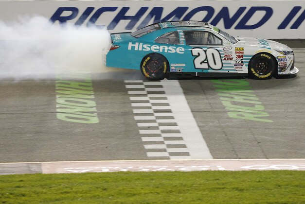 Apr 24, 2015; Richmond, VA, USA; Xfinity Series driver Denny Hamlin (20) celebrates after winning the Toyotacare 250 at Richmond International Raceway. Mandatory Credit: Amber Searls-USA TODAY Sports