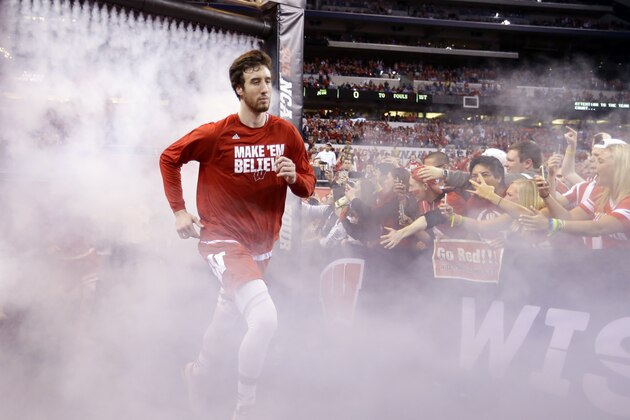 Wisconsin's Frank Kaminsky runs to the court before the NCAA Final Four college basketball tournament championship game against Duke Monday, April 6, 2015, in Indianapolis. (AP Photo/Michael Conroy)