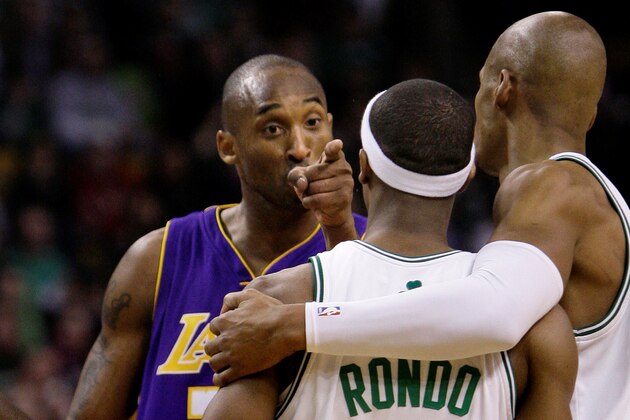 Los Angeles Lakers guard Kobe Bryant (24) points to Boston Celtics guard Rajon Rondo (9) after a foul in the second half of an NBA basketball game in Boston, Thursday Feb. 5, 2009. The Lakers beat the beat the Celtics 110-109 in overtime. At right holding Rondo is Celtics guard Ray Allen. (AP Photo/Charles Krupa) Los Angeles Lakers guard Kobe Bryant (24) points to Boston Celtics guard Rajon Rondo (9) after a foul in the second half of an NBA basketball game in Boston, Thursday Feb. 5, 2009. The Lakers beat the beat the Celtics 110-109 in overtime. At right holding Rondo is Celtics guard Ray Allen. (AP Photo/Charles Krupa)