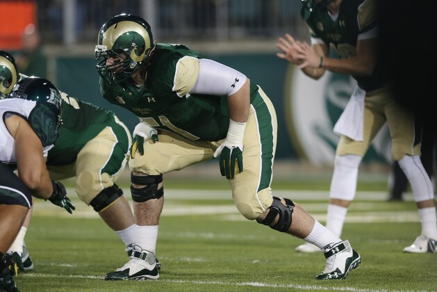 Colorado State offensive lineman Ty Sambrailo sets for play against Hawaii in the third quarter of Colorado State's 49-22 victory in an NCAA college football game in Fort Collins, Colo., on Saturday, Nov. 8, 2014. (AP Photo/David Zalubowski)