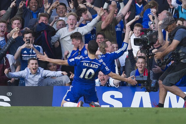 Chelsea's Eden Hazard, celebrates after scoring against Manchester United, during the English Premier League soccer match between Chelsea and Manchester United, at Stamford Bridge Stadium in London, Saturday, April 18, 2015. (AP Photo/Bogdan Maran) Chelsea's Eden Hazard, celebrates after scoring against Manchester United, during the English Premier League soccer match between Chelsea and Manchester United, at Stamford Bridge Stadium in London, Saturday, April 18, 2015. (AP Photo/Bogdan Maran)