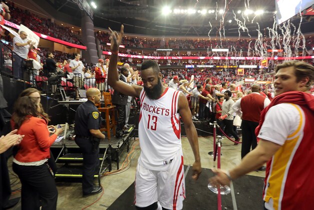 Apr 21, 2015; Houston, TX, USA; Houston Rockets guard James Harden (13) celebrates the win over the Dallas Mavericks in game two of the first round of the NBA Playoffs at Toyota Center. Rockets won 111 to 99. Mandatory Credit: Thomas B. Shea-USA TODAY Sports
