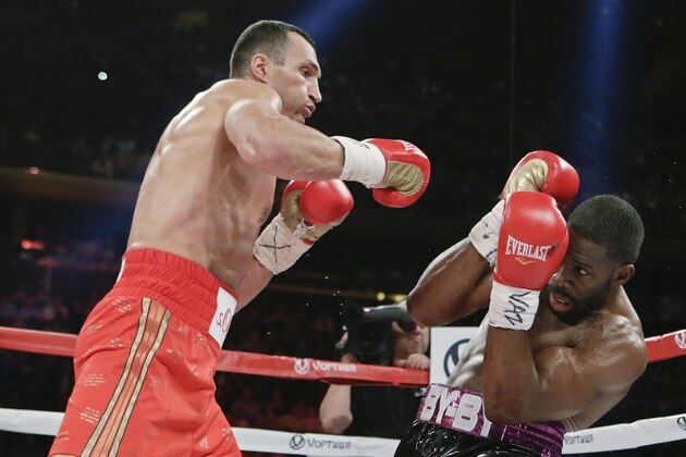 Wladimir Klitschko, left, of Ukraine, fights Bryant Jennings during the second round a boxing match Saturday, April 25, 2015, at Madison Square Garden in New York. (AP Photo/Frank Franklin II)
