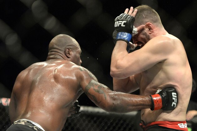 Apr 25, 2015; Montreal, Quebec, CAN; Rampage Jackson (red) and Fabio Maldonado (blue) fight during their catchweight bout during UFC 186 at Bell Centre. Mandatory Credit: Eric Bolte-USA TODAY Sports