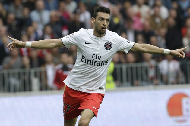 PSG's Javier Pastore reacts after scoring the first goal against Nice in their French League One soccer match, Saturday, April 18, 2015, in Nice stadium, southeastern France. (AP Photo/Lionel Cironneau)