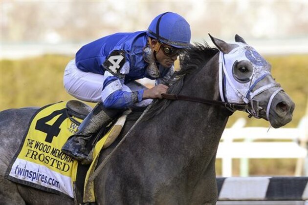 ADVANCE FOR WEEKEND EDITIONS, APRIL 25-26 - FILE - In this April 4, 2015, file photo, provided by the New York Racing Association, Frosted, with jockey Joel Roario, captures the $1 million Wood Memorial horse race at Aqueduct in New York. Next weekend, Kiaran McLaughlin will send out his sixth Kentucky Derby starter in Frosted, a colt he believes has a good shot to become his first Derby winner. (AP Photo/New York Racing Association, File)