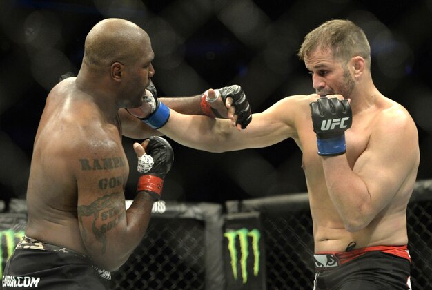 Apr 25, 2015; Montreal, Quebec, CAN; Rampage Jackson (red) and Fabio Maldonado (blue) fight during their catchweight bout during UFC 186 at Bell Centre. Mandatory Credit: Eric Bolte-USA TODAY Sports