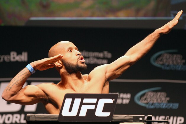Apr 24, 2015; Montreal, Quebec, CAN; Demetrious Johnson stands on the scale during weigh-ins for UFC 186 at Metropolis. Mandatory Credit: Jean-Yves Ahern-USA TODAY Sports