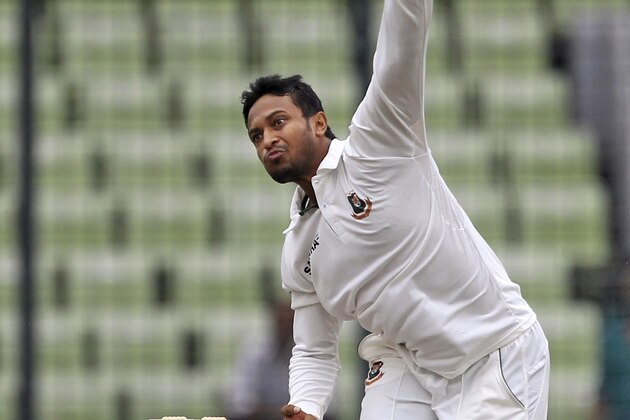 Bangladesh’s Shakib AL Hasan bowls during the third day of the first cricket test match against Zimbabwe in Dhaka, Bangladesh, Monday, Oct. 27, 2014. (AP Photo/A.M. Ahad)
