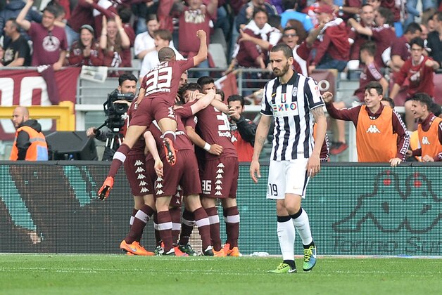 Torino players celebrates after Fabio Quagliarella scored during a Serie A soccer match between Torino and Juventus at the Olympic stadium, in Turin, Italy, Sunday, April 26, 2015. (AP Photo/Massimo Pinca)