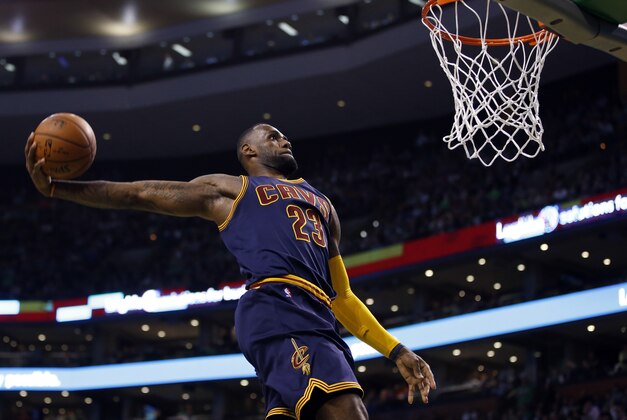 Apr 23, 2015; Boston, MA, USA; Cleveland Cavaliers forward LeBron James (23) dunks against the Boston Celtics during the second half in game three of the first round of the NBA Playoffs at TD Garden. The Cavaliers defeated the Celtics 103.95. Mandatory Credit: David Butler II-USA TODAY Sports