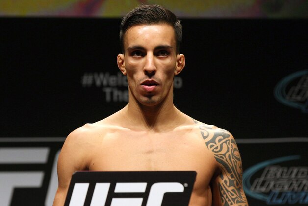 Apr 24, 2015; Montreal, Quebec, CAN; Thomas Almeida stands on the scale during weigh-ins for UFC 186 at Metropolis. Mandatory Credit: Jean-Yves Ahern-USA TODAY Sports