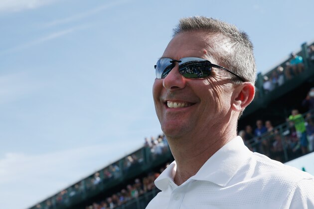 SCOTTSDALE, AZ - JANUARY 28:  Urban Meyer, head football coach at  Ohio State University,  looks up to the gallery on the 16th hole during the pro-am prior to the start of the Waste Management Phoenix Open at TPC Scottsdale on January 28, 2015 in Scottsdale, Arizona.  (Photo by Scott Halleran/Getty Images)