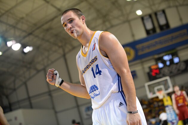 SANTA CRUZ, CA - APRIL 26: Aaron Craft #14 of the Santa Cruz Warriors celebrates against the Fort Wayne Mad Ants in Game Two of the NBA D-League Finals on April 26, 2015 at Kaiser Permanente Arena in Santa Cruz, California. NOTE TO USER: User expressly acknowledges and agrees that, by downloading and/or using this Photograph, user is consenting to the terms and conditions of the Getty Images License Agreement. Mandatory Copyright Notice: Copyright 2015 NBAE (Photo by Noah Graham/NBAE via Getty Images)