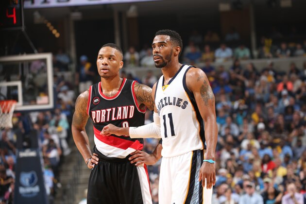 MEMPHIS, TN - APRIL 22:  Damian Lillard #0 of the Portland Trail Blazers and Mike Conley #11 of the Memphis Grizzlies in Game Two of the Western Conference Quarterfinals during the 2015 NBA Playoffs on April 22, 2015 at FedExForum in Memphis, Tennessee. NOTE TO USER: User expressly acknowledges and agrees that, by downloading and or using this photograph, User is consenting to the terms and conditions of the Getty Images License Agreement. Mandatory Copyright Notice: Copyright 2015 NBAE (Photo by Joe Murphy/NBAE via Getty Images)