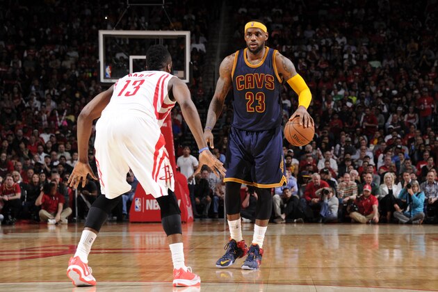 HOUSTON, TX - MARCH 1: LeBron James #23 of the Cleveland Cavaliers defends the ball against James Harden #13 of the Houston Rockets during the game on March 1, 2015 at the Toyota Center in Houston, Texas. NOTE TO USER: User expressly acknowledges and agrees that, by downloading and or using this photograph, User is consenting to the terms and conditions of the Getty Images License Agreement. Mandatory Copyright Notice: Copyright 2015 NBAE (Photo by Bill Baptist/NBAE via Getty Images)
