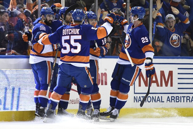 New York Islanders defenseman Johnny Boychuk (55), Nick Leddy (2) center John Tavares (91), center Ryan Strome (18) and center Brock Nelson (29) celebrate Tavares's goal against the Washington Capitals during the first period in Game 6 in the first round of the NHL hockey Stanley Cup playoffs at Nassau Coliseum on Saturday, April 25, 2015, in Uniondale, N.Y. The Islanders won 3-1 to even the best-of-seven games series at 3-3. (AP Photo/Kathy Kmonicek) New York Islanders defenseman Johnny Boychuk (55), Nick Leddy (2) center John Tavares (91), center Ryan Strome (18) and center Brock Nelson (29) celebrate Tavares's goal against the Washington Capitals during the first period in Game 6 in the first round of the NHL hockey Stanley Cup playoffs at Nassau Coliseum on Saturday, April 25, 2015, in Uniondale, N.Y. The Islanders won 3-1 to even the best-of-seven games series at 3-3. (AP Photo/Kathy Kmonicek)