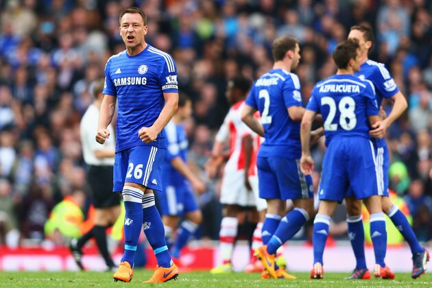LONDON, ENGLAND - APRIL 26:  John Terry of Chelsea (24) celebrates with team mates after the Barclays Premier League match between Arsenal and Chelsea at Emirates Stadium on April 26, 2015 in London, England.  (Photo by Paul Gilham/Getty Images)