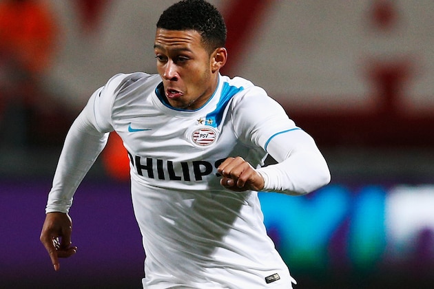 ENSCHEDE, NETHERLANDS - APRIL 04:  Memphis Depay of PSV in action during the Dutch Eredivisie match between FC Twente and PSV Eindhoven held at De Grolsch Veste Stadium on April 4, 2015 in Enschede, Netherlands.  (Photo by Dean Mouhtaropoulos/Getty Images)