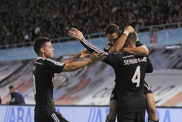 VIGO, SPAIN - APRIL 26:  Javier 'Chicharito' Hernandez of Real Madrid celebrates with Sergio Ramos and James Rodriguez after scoring Real's 4th goal during the La Liga match between Celta Vigo and Real Madrid CF at Estadio Balaidos on April 26, 2015 in Vigo, Spain.  (Photo by Denis Doyle/Getty Images)