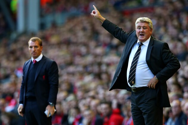 LIVERPOOL, ENGLAND - OCTOBER 25:  Steve Bruce, manager of Hull City gestures next to Brendan Rodgers, manager of Liverpool during the Barclays Premier League match between Liverpool and Hull City at Anfield on October 25, 2014 in Liverpool, England.  (Photo by Alex Livesey/Getty Images)