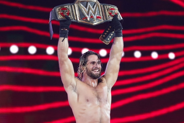 IMAGE DISTRIBUTED FOR WWE - WWE Superstar Seth Rollins celebrates becoming the new WWE World Heavyweight Champion at WrestleMania 31 at Levi's Stadium on Sunday, March 29, 2015 in Santa Clara, CA. WrestleMania broke the Levi’s Stadium attendance record at 76,976 fans from all 50 states and 40 countries. (Don Feria/AP Images for WWE)