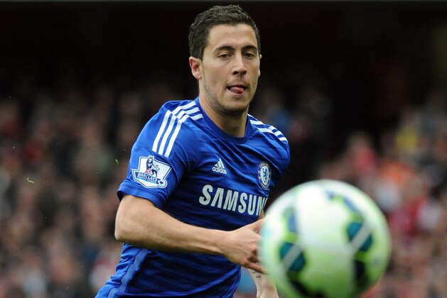 Chelsea's Eden Hazard watches the ball during the English Premier League soccer match between Arsenal and Chelsea at the Emirates Stadium, London, England, Sunday, April 26, 2015. (AP Photo/Rui Vieira)
