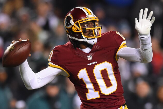 LANDOVER, MD - DECEMBER 20: Quarterback Robert Griffin III #10 of the Washington Redskins throws a pass in the second half against the Philadelphia Eagles at FedExField on December 20, 2014 in Landover, Maryland. The Washington Redskins won, 27-24. (Photo by Patrick Smith/Getty Images)