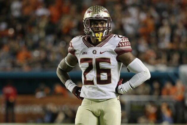 Florida State Seminoles defensive back P.J. Williams (26) stands in the field in the second half an NCAA college football game against Miami, Saturday, Nov. 15, 2014, in Miami Gardens, Fla. (AP Photo/Lynne Sladky)