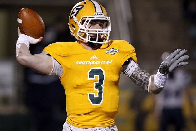 Southeastern Louisiana quarterback Bryan Bennett (3) throws the ball during the first half of an NCAA college football Division 1 championship quarterfinal game against New Hampshire in Hammond, La., Saturday, Dec. 14, 2013. New Hampshire won 20-17. (AP Photo/Jonathan Bachman)