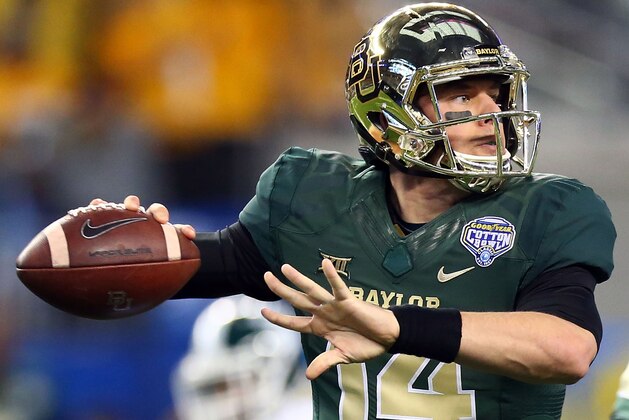ARLINGTON, TX - JANUARY 01:  Bryce Petty #14 of the Baylor Bears passes against the Michigan State Spartans during the first half of the Goodyear Cotton Bowl Classic at AT&T Stadium on January 1, 2015 in Arlington, Texas.  (Photo by Ronald Martinez/Getty Images)