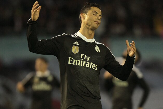Real Madrid's Cristiano Ronaldo from Portugal, gestures during a Spanish La Liga soccer match between RC Celta and Real Madrid at the Balaídos stadium in Vigo, Spain, Sunday,April 26, 2015. (AP Photo/Lalo R. Villar)