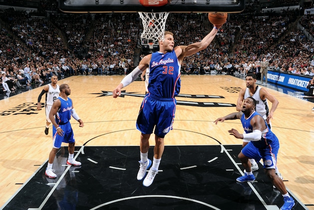 SAN ANTONIO - APRIL 26: Blake Griffin #32 of the Los Angeles Clippers grabs a rebound against the San Antonio Spurs during Game Four of the Western Conference Quarterfinals at the AT&T Center on April 26, 2015 in San Antonio, Texas. NOTE TO USER: User expressly acknowledges and agrees that, by downloading and or using this photograph, user is consenting to the terms and conditions of the Getty Images License Agreement. Mandatory Copyright Notice: Copyright 2015 NBAE (Photos by Garrett Ellwood/NBAE via Getty Images)