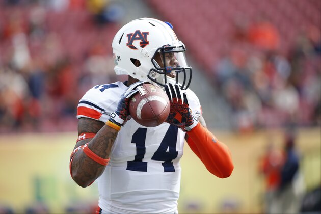 TAMPA, FL - JANUARY 1: Quarterback Nick Marshall #14 of the Auburn Tigers warms up before the start of the Outback Bowl against the Wisconsin Badgers on January 1, 2015 at Raymond James Stadium in Tampa, Florida.  (Photo by Brian Blanco/Getty Images)