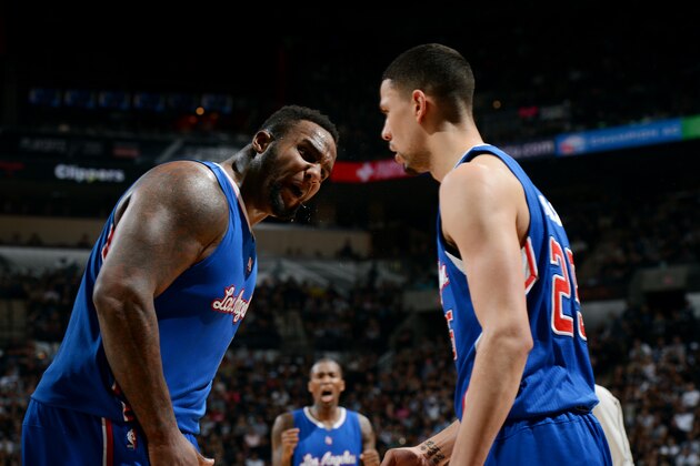 SAN ANTONIO - APRIL 26: Glen Davis #0 and Austin Rivers #25 of the Los Angeles Clippers celebrate during a game against the San Antonio Spurs during Game Four of the Western Conference Quarterfinals at the AT&T Center on April 26, 2015 in San Antonio, Texas. NOTE TO USER: User expressly acknowledges and agrees that, by downloading and or using this photograph, user is consenting to the terms and conditions of the Getty Images License Agreement. Mandatory Copyright Notice: Copyright 2015 NBAE (Photos by Garrett Ellwood/NBAE via Getty Images)
