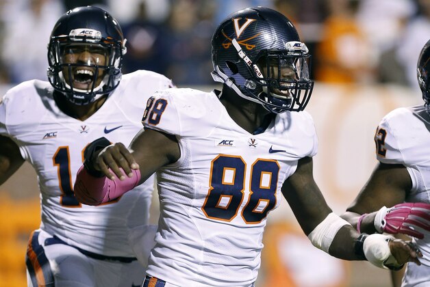 Oct 4, 2014; Charlottesville, VA, USA; Virginia Cavaliers linebacker Max Valles (88) celebrates with teammates after returning an interception for a touchdown against the Pittsburgh Panthers in the second quarter at Scott Stadium. Mandatory Credit: Geoff Burke-USA TODAY Sports