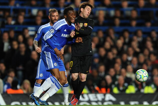 LONDON, ENGLAND - APRIL 18:  John Obi Mikel of Chelsea and Lionel Messi of Barcelona collide during the UEFA Champions League Semi Final first leg match between Chelsea and Barcelona at Stamford Bridge on April 18, 2012 in London, England.  (Photo by Michael Regan/Getty Images)