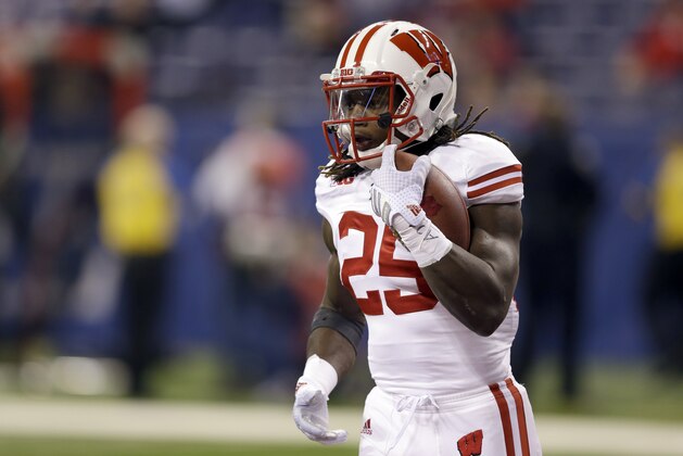 Wisconsin running back Melvin Gordon warms up before the start of the Big Ten Conference championship NCAA college football game between Ohio State and Wisconsin Saturday, Dec. 6, 2014, in Indianapolis. (AP Photo/Michael Conroy)