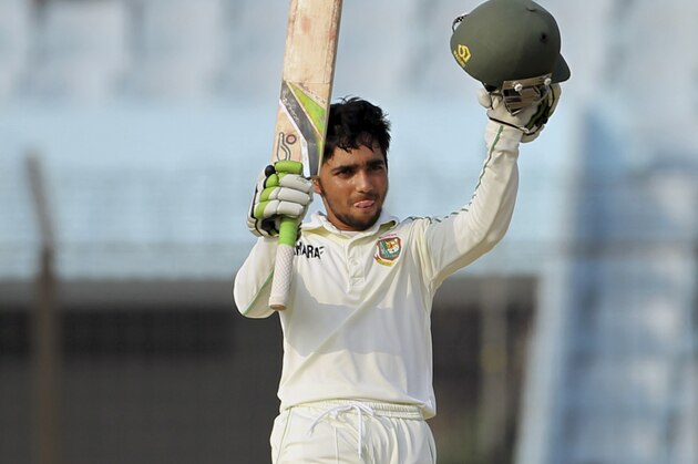 Bangladesh’s Mominul Haque acknowledges the crowd after scoring a century on the fifth day of the second test cricket match against Bangladesh in Chittagong, Bangladesh, Saturday, Feb. 8, 2014. Sri Lanka and Bangladesh ended in a draw on the fifth and final day Saturday. (AP Photo)