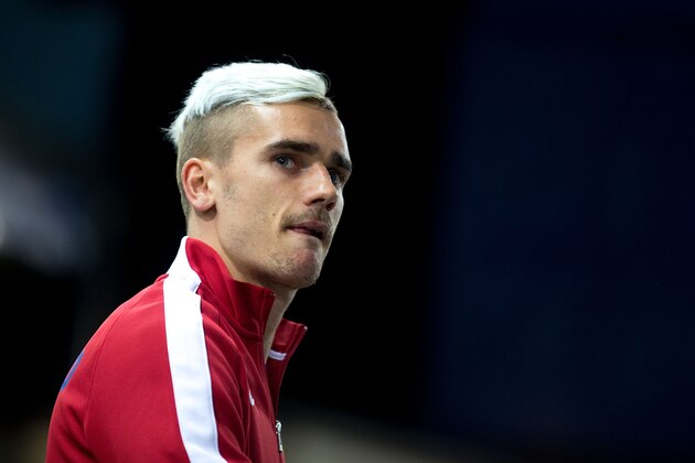 MADRID, SPAIN - MARCH 17:  Antoine Griezmann bites his tongue as he enters the pitch prior to start the UEFA Champions League round of 16 second leg match between Club Atletico de Madrid and Bayer 04 Leverkusen at Vicente Calderon Stadium on March 17, 2015 in Madrid, Spain.  (Photo by Gonzalo Arroyo Moreno/Getty Images)