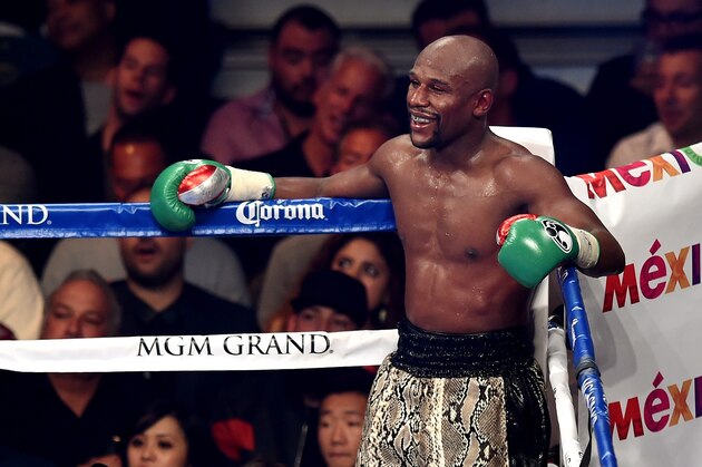 LAS VEGAS, NV - SEPTEMBER 13:  Floyd Mayweather Jr. looks on while taking on Marcos Maidana during their WBC/WBA welterweight title fight at the MGM Grand Garden Arena on September 13, 2014 in Las Vegas, Nevada.  (Photo by Ethan Miller/Getty Images)