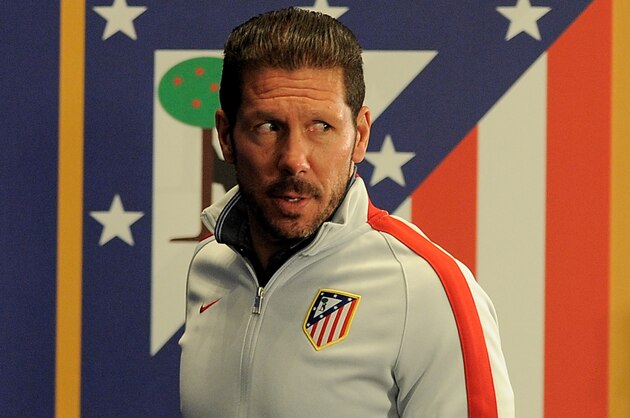 MADRID, SPAIN - APRIL 21:  Head coach Diego Simeone of Club Atletico de Madrid arrives for his press conference at Estadio Vicente Calderon ahead of the UEFA Champions League, 2nd Leg match between Club Atletico de Madrid and Real Madrid on April 21, 2015 in Madrid, Spain.  (Photo by Denis Doyle/Getty Images)