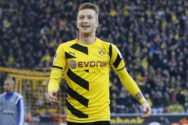 Dortmund's Marco Reus during the German first division Bundesliga soccer match between BvB Borussia Dortmund  and Schalke 04 in Dortmund, Germany, Saturday, Feb. 28, 2015. (AP Photo/Frank Augstein)