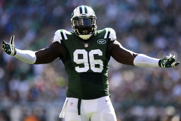 EAST RUTHERFORD, NJ - SEPTEMBER 28:   Muhammad Wilkerson #96 of the New York Jets reacts during their game against the Detroit Lions at MetLife Stadium on September 28, 2014 in East Rutherford, New Jersey.  (Photo by Ron Antonelli/Getty Images)