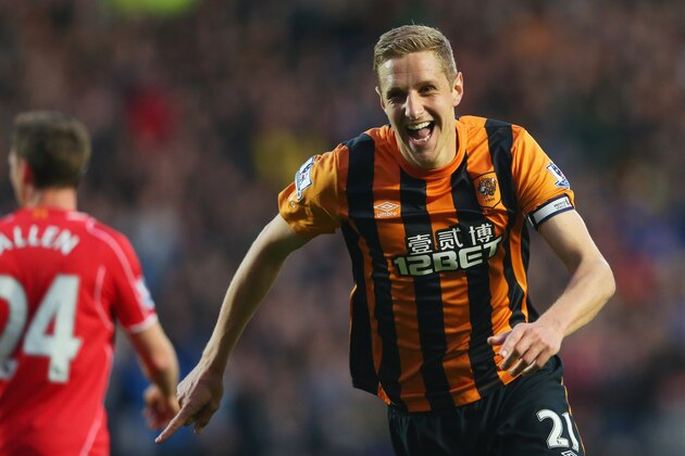 HULL, ENGLAND - APRIL 28:  Michael Dawson of Hull City celebrates as he scores their first goal during the Barclays Premier League match between Hull City and Liverpool at KC Stadium on April 28, 2015 in Hull, England.  (Photo by Alex Livesey/Getty Images)