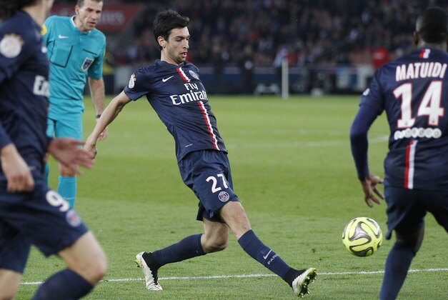 PSG's Argentinian Javier Pastore, controls the ball during a League One soccer match Paris Saint Germain against Lens at Parc des Prince stadium in Paris, France, Saturday, March 7, 2015. (AP Photo/Michel Euler)